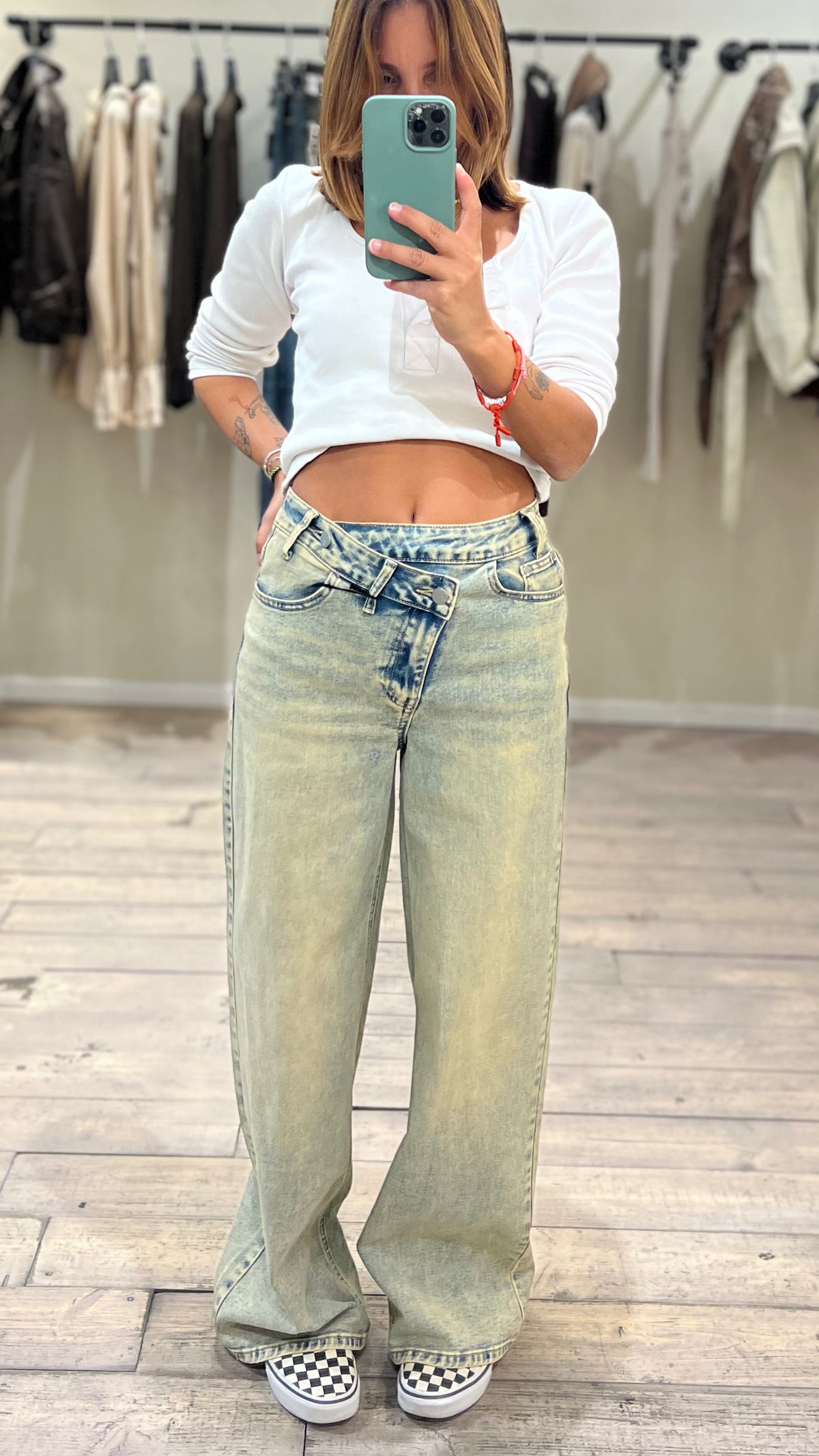 Jeans bottone obliquo