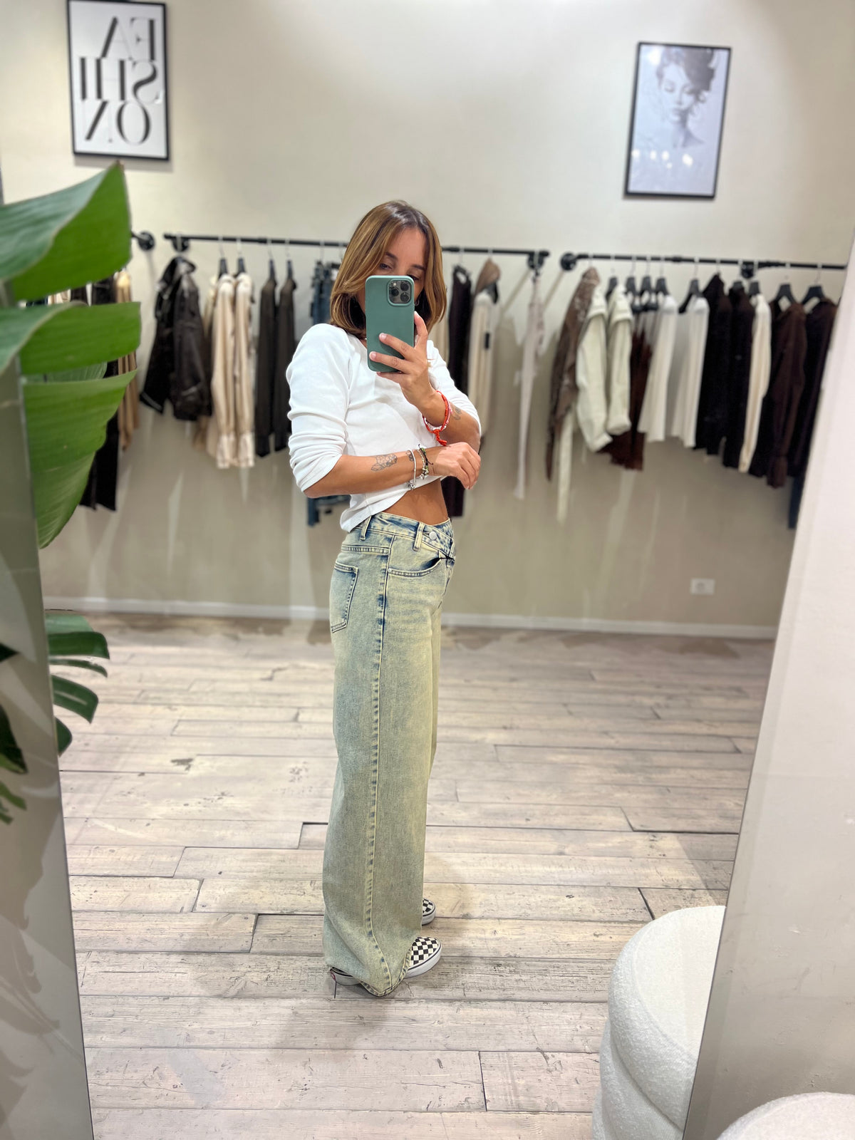Jeans bottone obliquo