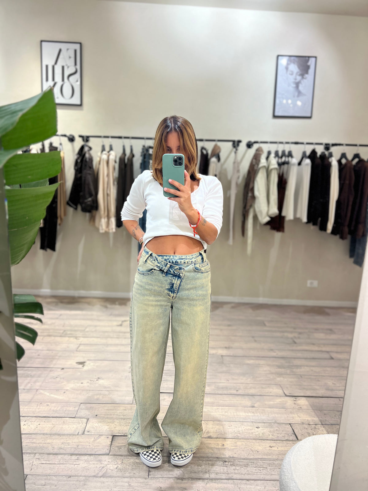 Jeans bottone obliquo